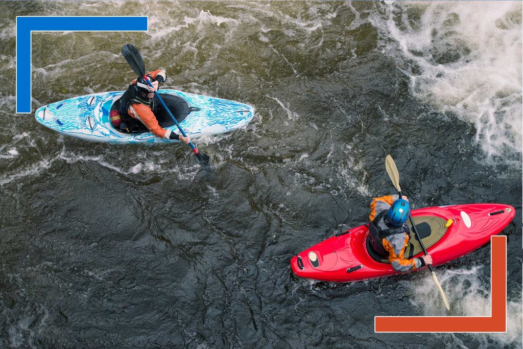 Two kayakers navigating a river from above, symbolizing real-time decision-making and data-driven journeys