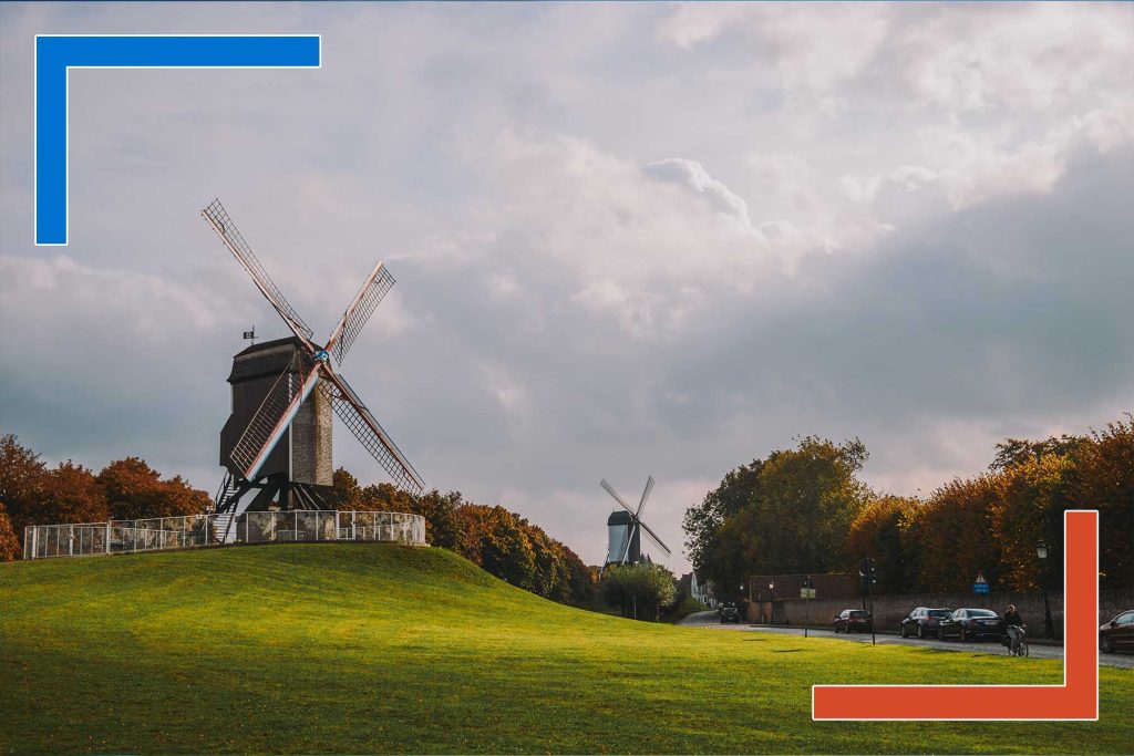 Windmills symbolizing sustainable data practices and green data strategy for cost savings