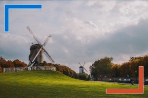 Windmills symbolizing sustainable data practices and green data strategy for cost savings